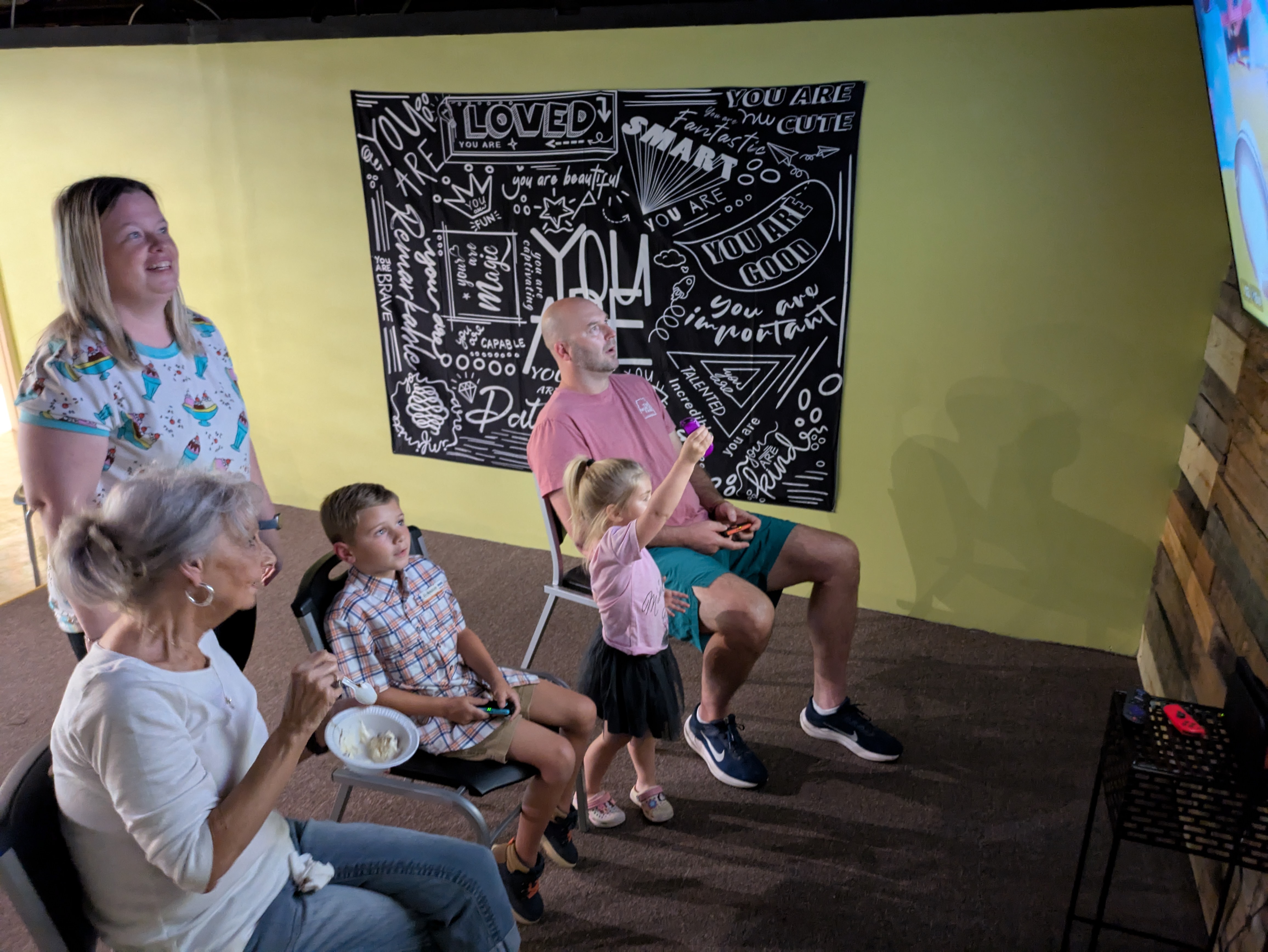 Families and congregation enjoying a community event at The Crossing